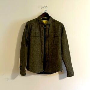 This is 1 of 101 pieces that were made. It says size large, but I always wear S.